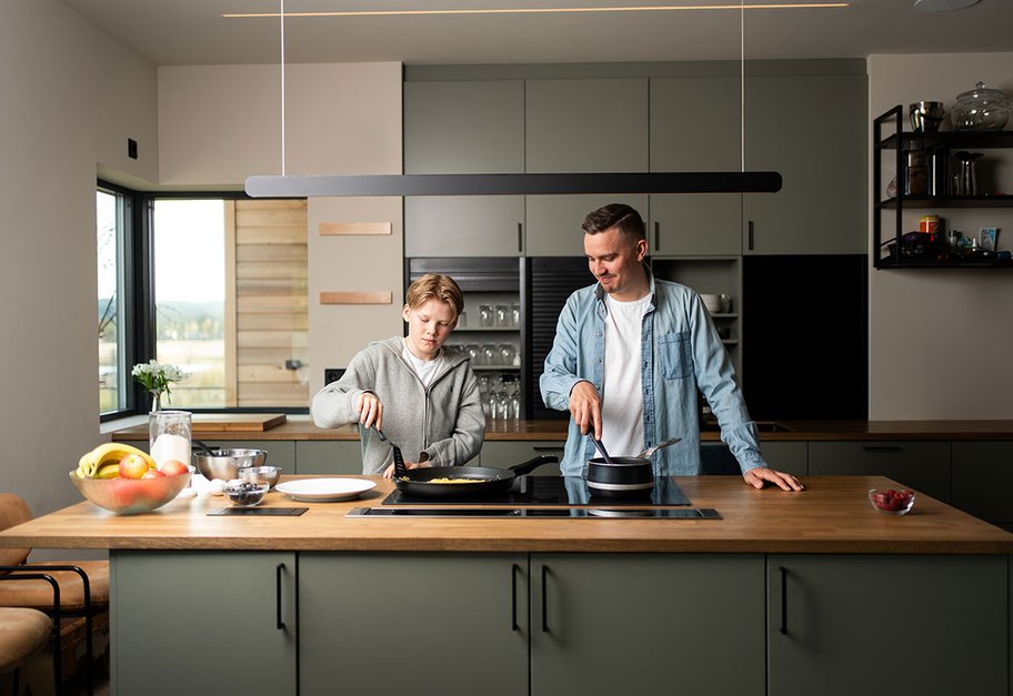 Cooking in bright and well-ventilated kitchen