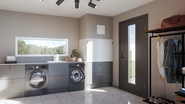 The image shows a utility and laundry room where a Nordic residential air handling unit is integrated as the home’s ventilation solution. Its placement provides easy service access and supports a stable, energy-efficient indoor climate throughout the hous